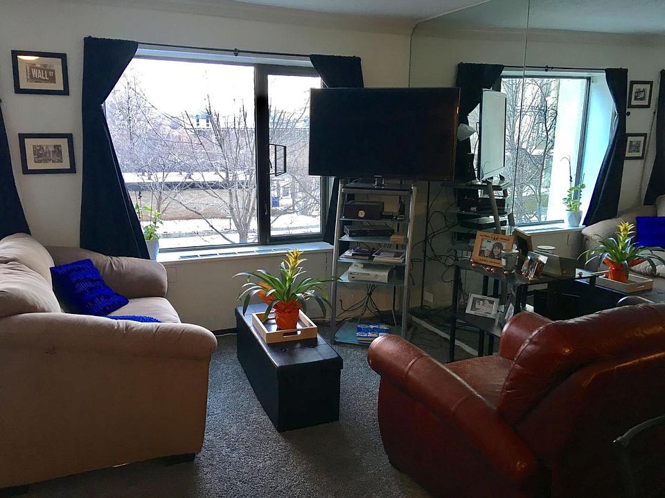 Well organized living room overlooking the courtyard from th