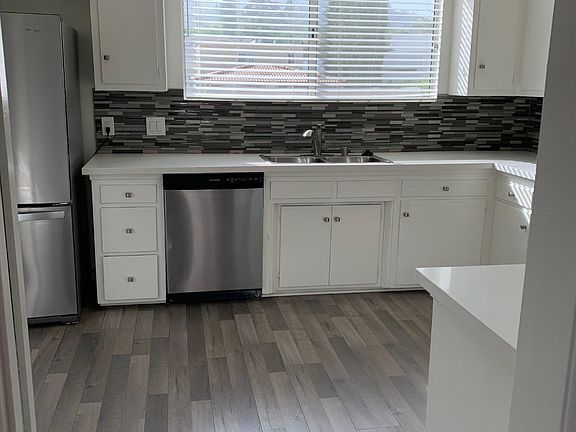 Stove, refrigerator, dishwasher, washer and dryer included.