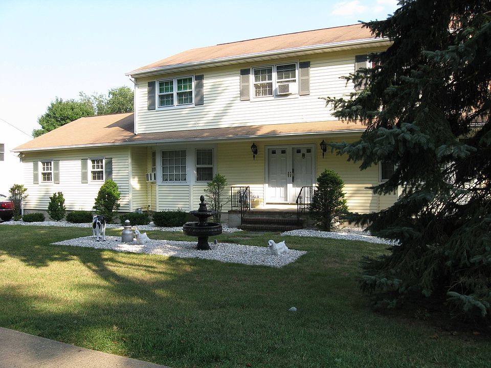Front of house with fountain
