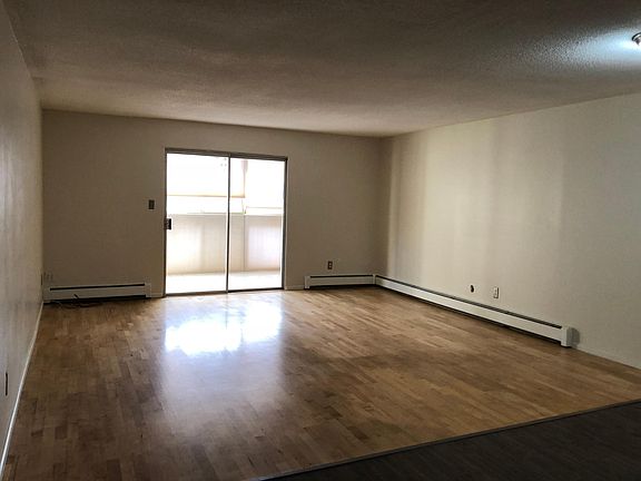 Large great room leads to enclosed lanai.