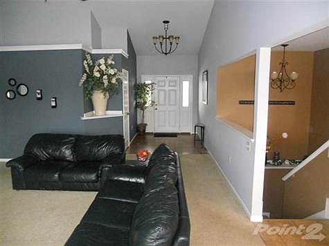 As you enter the home you immediately notice the hard wood floors in the foyer and the open floor plan.