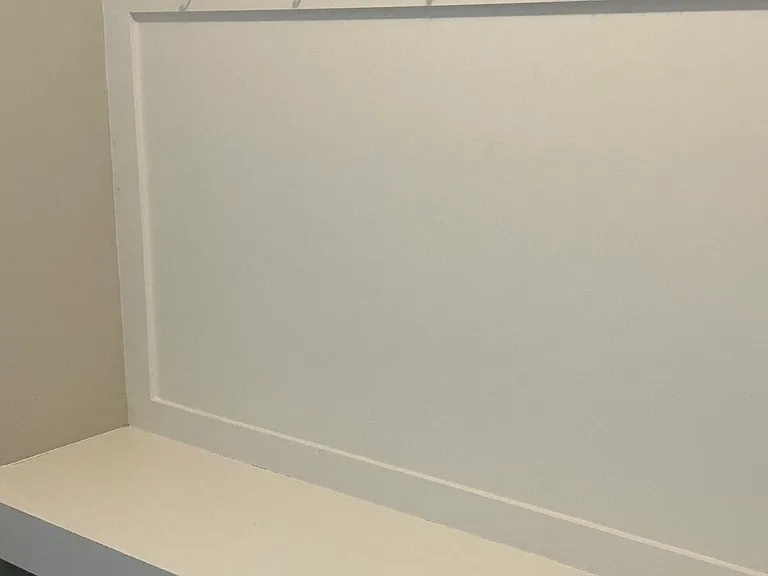 Mud room area upon entering home from two-car garage
