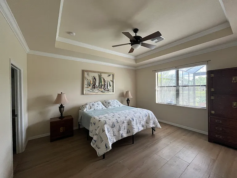 Primary bedroom suite complete with King bed, private full bath and walk in closet
