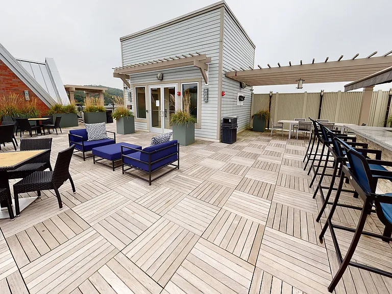 Socialize and enjoy the sun on this rooftop resident space