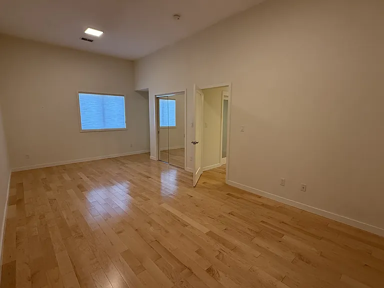 Oversized primary bedroom, with a spacious closet with double mirrored sliding door including a beautiful in-suite bathroom.