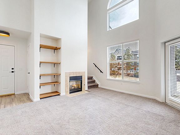 Living room with vaulted ceiling