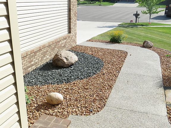 front pebble sidewalk