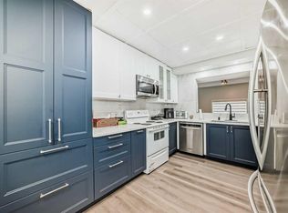 7 E Westland Rd #2, Okotoks, AB T1S1Z1