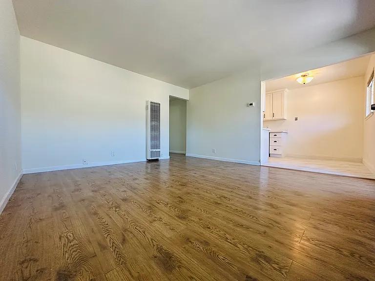 Living room 14' by 13.5'. big enough to allocate a corner for office