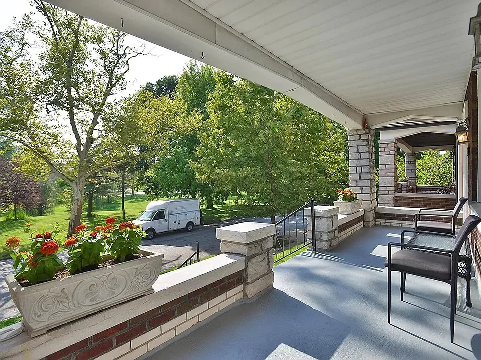 Spacious front porch w/ park views