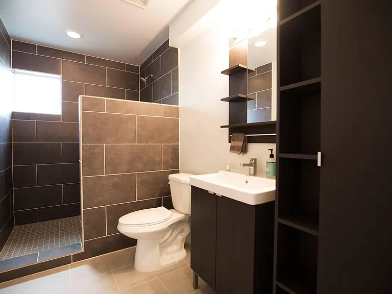 Two full bathrooms, one with shower and one with a bath tub