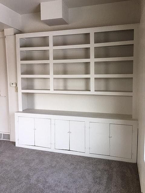 built in bookshelf in living room