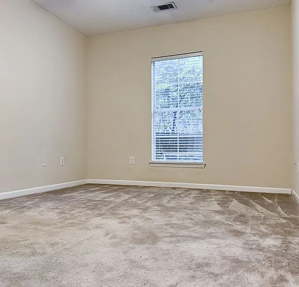 Master bedroom. Note ceiling fan.