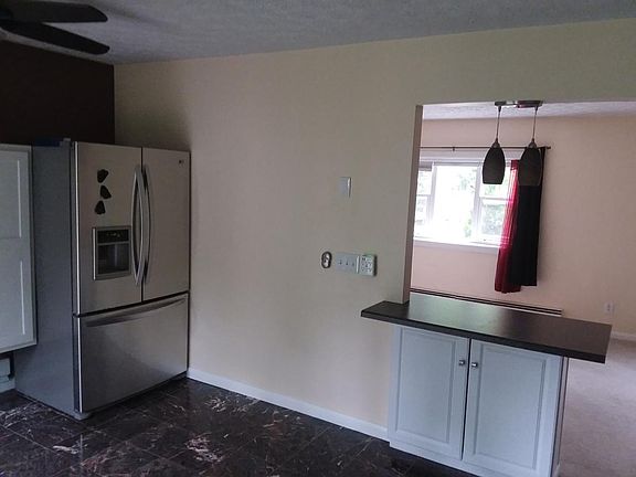 Large refrigerator and breakfast nook
