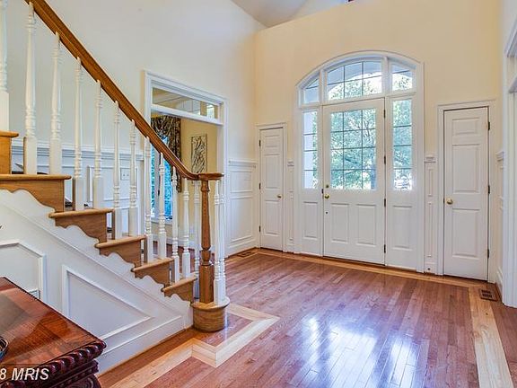 Impressive foyer w/closets on both sides of door.