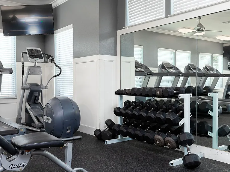 Get Fit with Cardio Machines and Free Weights at Seaglass Apartments - Active Corpus Christi Living