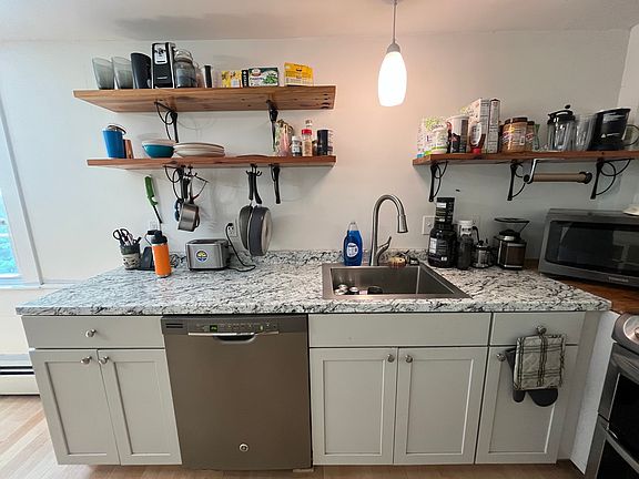 Updated Kitchen w/newer appliances, cabinets & counters