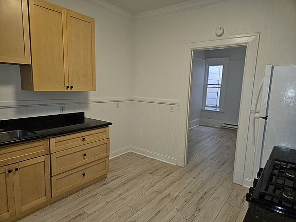 kitchen looking into 2nd room