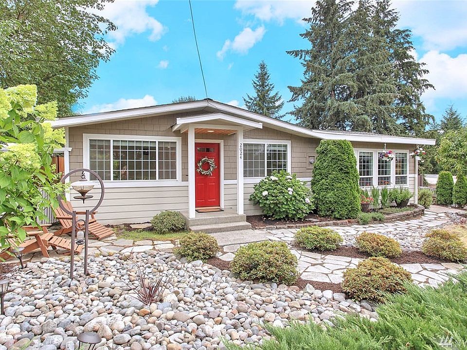 Beautifully remodeled and impeccably maintained Kennydale rambler.  Gorgeous gardens filled with perennials selected to give blooms and color almost every month of the year.  