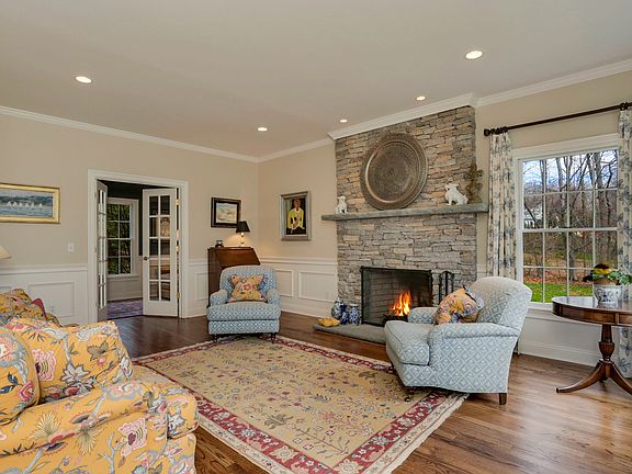 Living room with office through French doors 