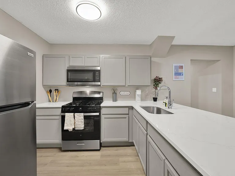 fully equipped kitchen, fridge, oven, stove, microwave, Keurig, plates, etc