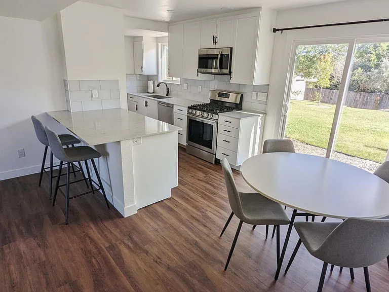 6852 S Clermont Dr — Photo 1