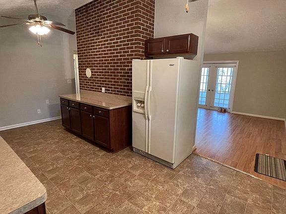 Kitchen has room for small table.