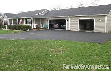 @ 2 car garage with added 20 ft. wide garage/workshop