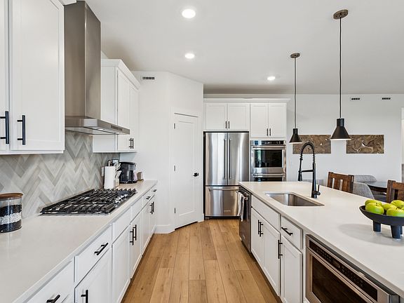 The beautiful kitchen has energy-efficient appliances.