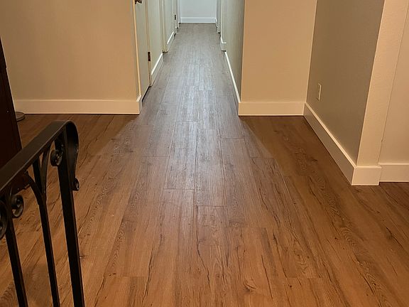 Living room entry and hallway to the bedrooms