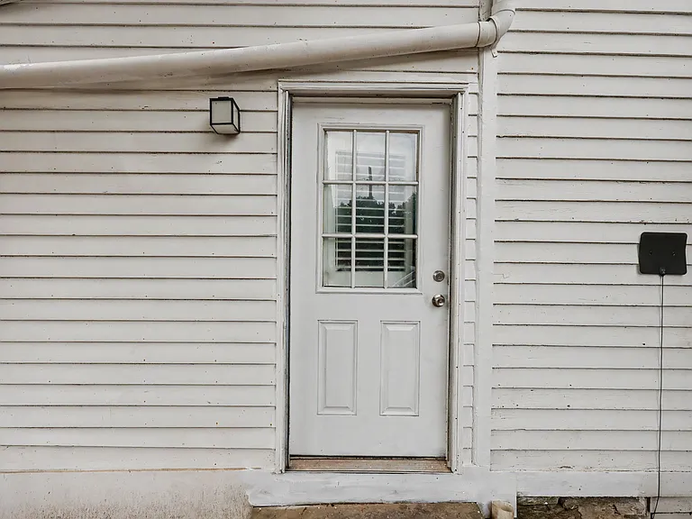 rear entrance to 47 Church St. Unit 1