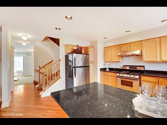 granite countertops and stainless steel kitchen