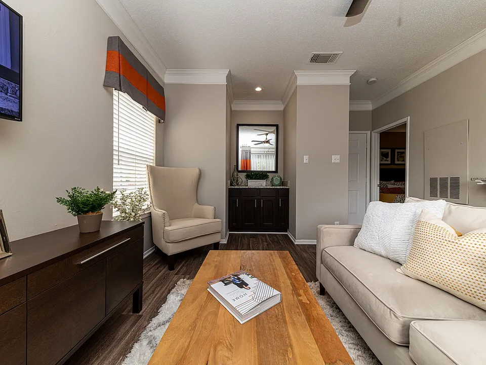 Spacious living room with hardwood-style flooring