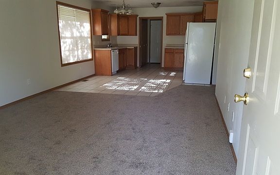 View from the front door: Livingroom/Dining room/ Kitchen/Laundry room