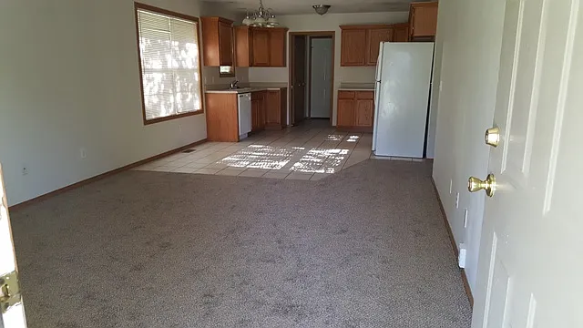 View from the front door: Livingroom/Dining room/ Kitchen/Laundry room