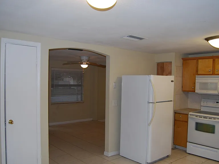 Kitchen Leading to Front Entrance/Living Room