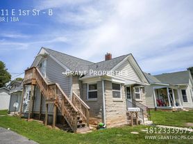 211 E 1st St
