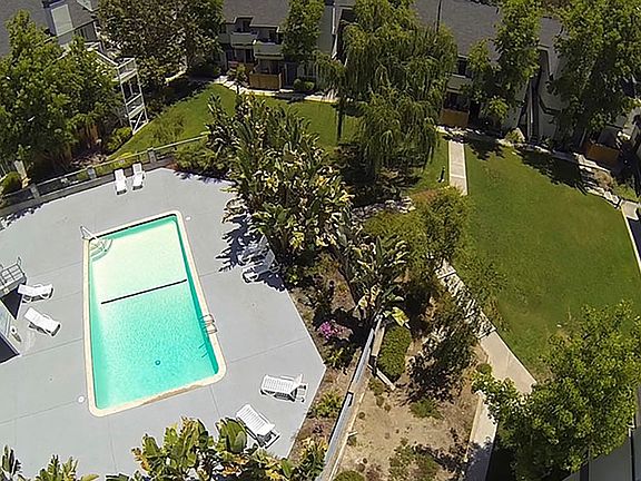 Community Center with sparkling pool.