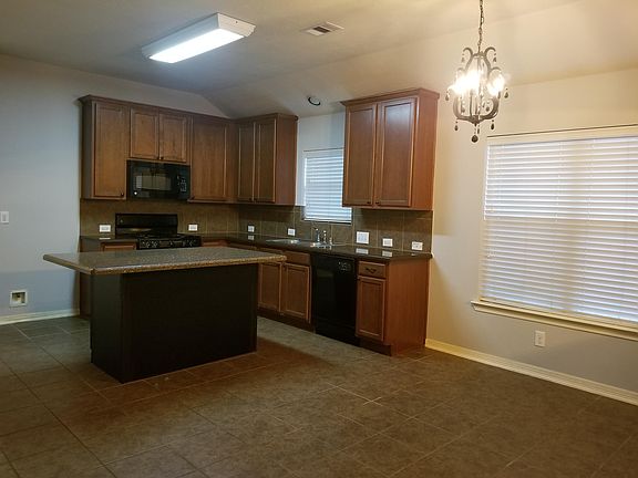 Kitchen with lots of storage. Refridgerator will be provided