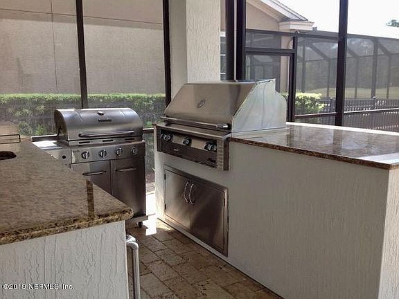 5th image of 413 Saint Johns Golf Dr