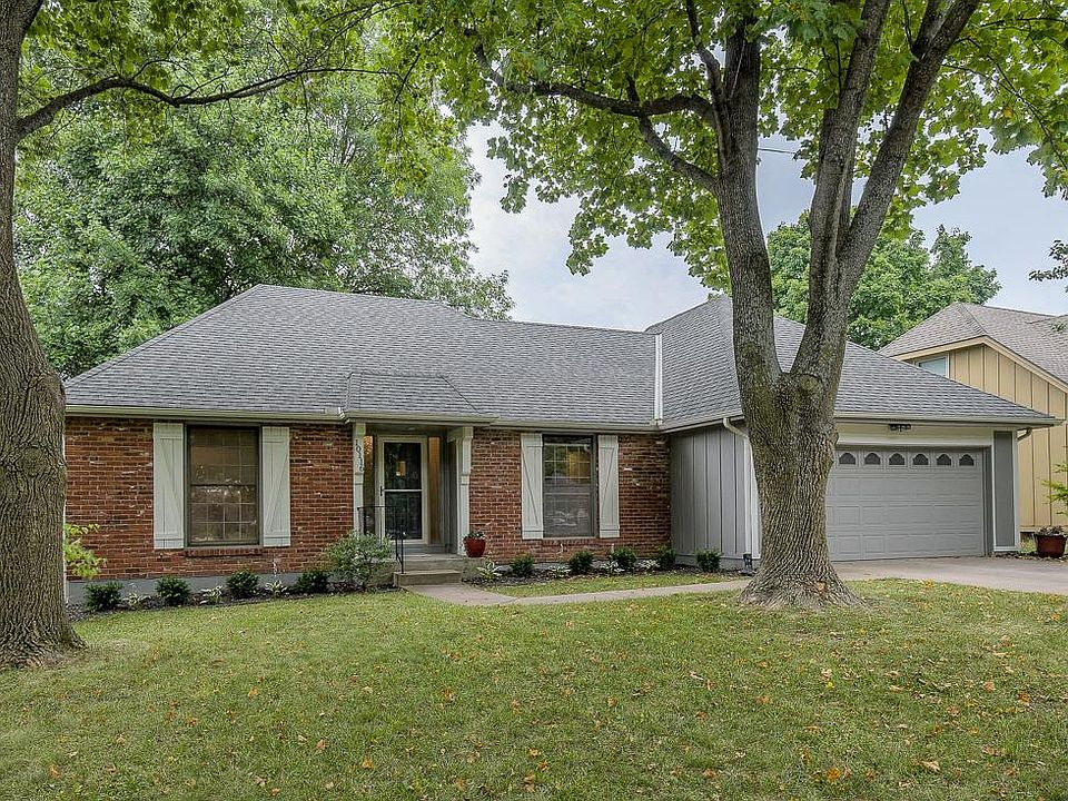 Lovely home with mature trees and great front and back yards.