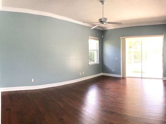 Master bedroom overlooks pool and sunset.