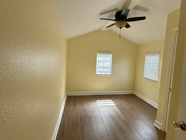 Back bedroom is roughly 10x14.