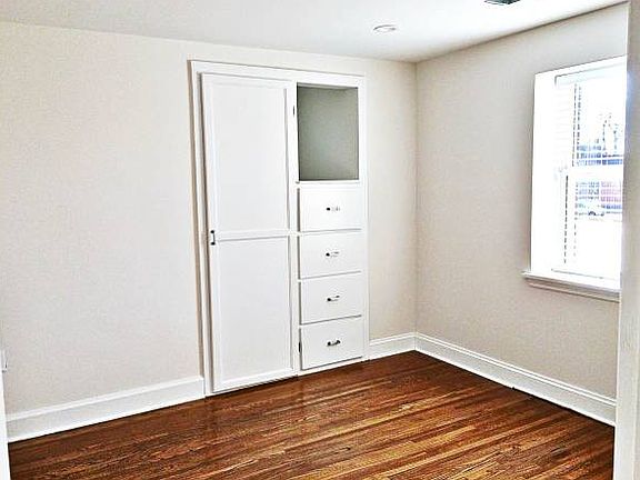 Bright bedroom with built ins