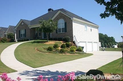 STREET VIEW OF HOME
						:
						FRONT PORCH W/ ROOM FOR LOUNGING FURNITURE / BEAUTIFUL LANDSCAPING