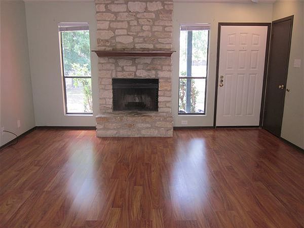 Wonderful living room... fireplace, wood floors, vaulted cei