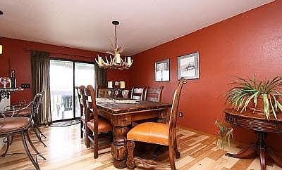 Check out those hickory floors!  real antler chandilier!