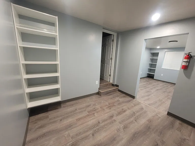 Bedroom 1 walk-in closet and entrance to bathroom