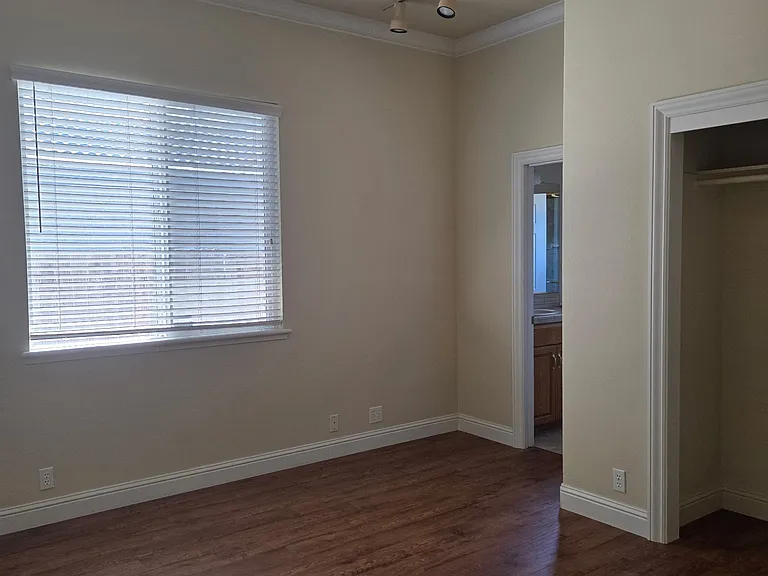 Bedroom or Office with shared bathroom to bedroom nextdoor. Large closet and ceiling fans