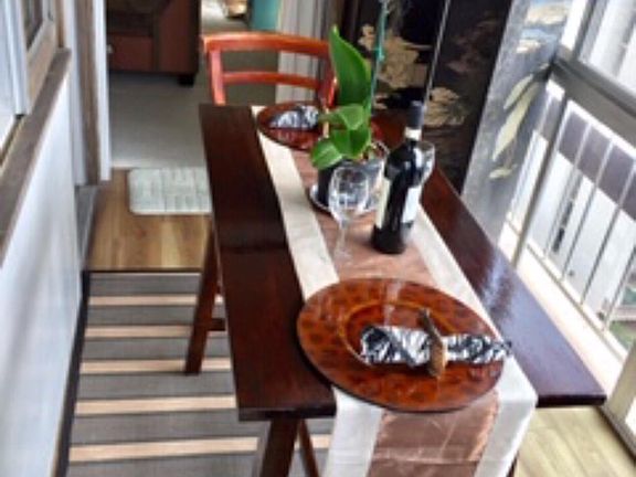 Dining area with partial ocean view desk